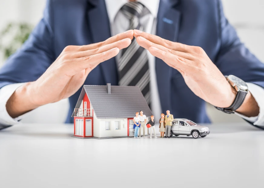 Family home and car with insurance protection concept showing financial security and coverage support